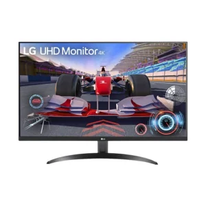 LG UHD Monitor 4K displaying a red Formula 1 race car on a racetrack, with a curved screen and silver stand.