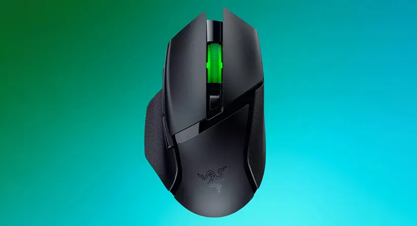 Top-down view of a black gaming mouse with a glowing green scroll wheel on a teal background.