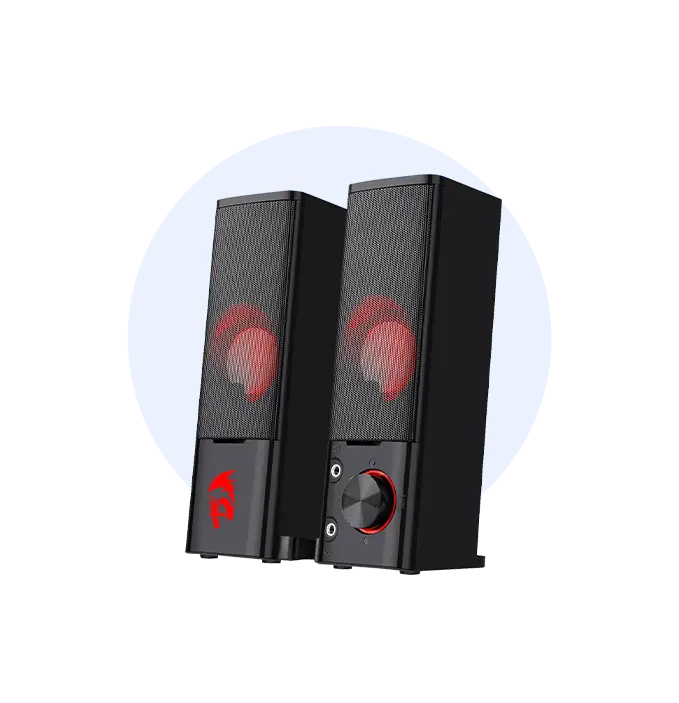 Pair of black desktop speakers with red mesh grills, shown side-by-side with a control knob on the right speaker.
